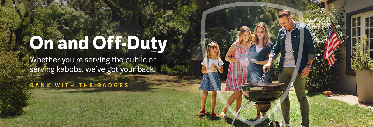 Family having a barbecue in their yard.