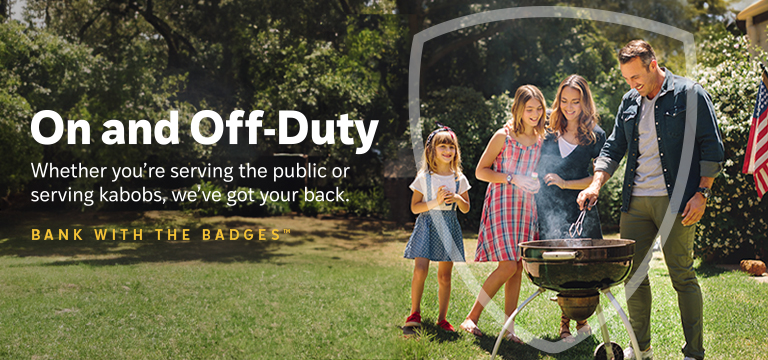 Family having a barbecue in their yard.